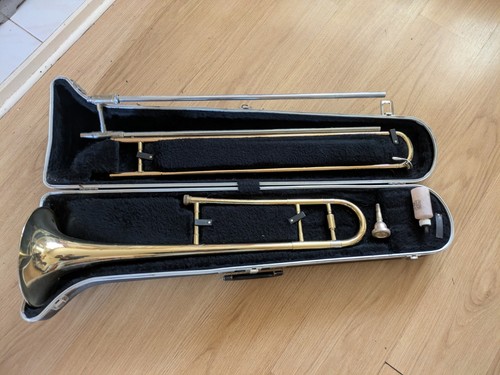 Brass trombone with mouthpiece - trombone,