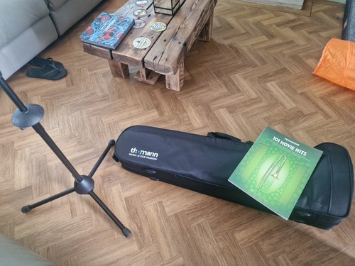 Brass trombone with mouthpiece - with,
